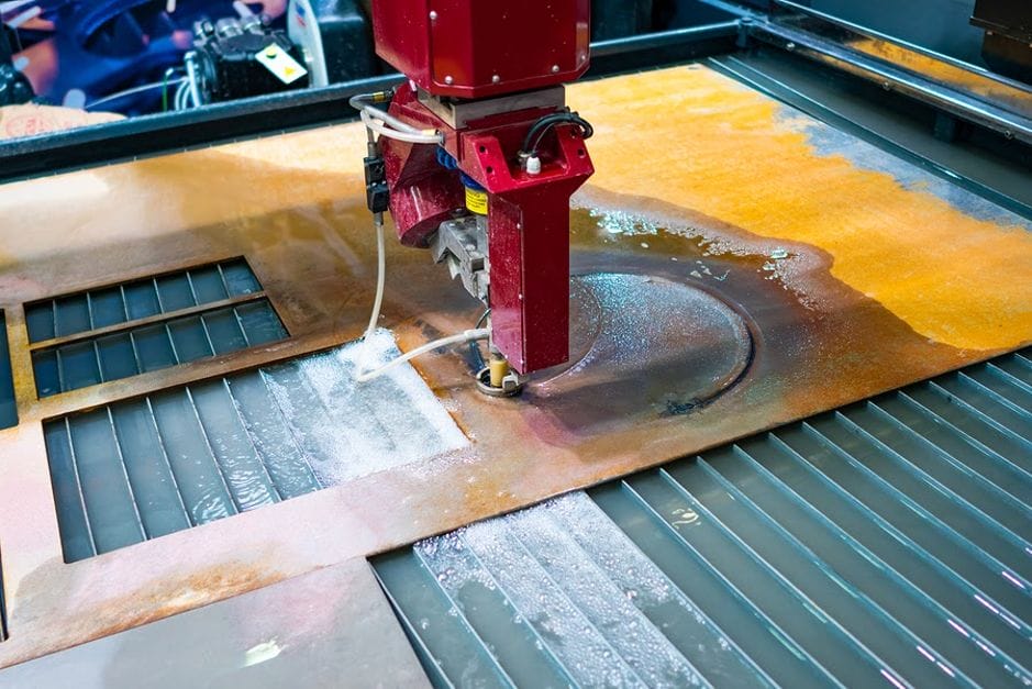 A waterjet machine cutting sheet metal