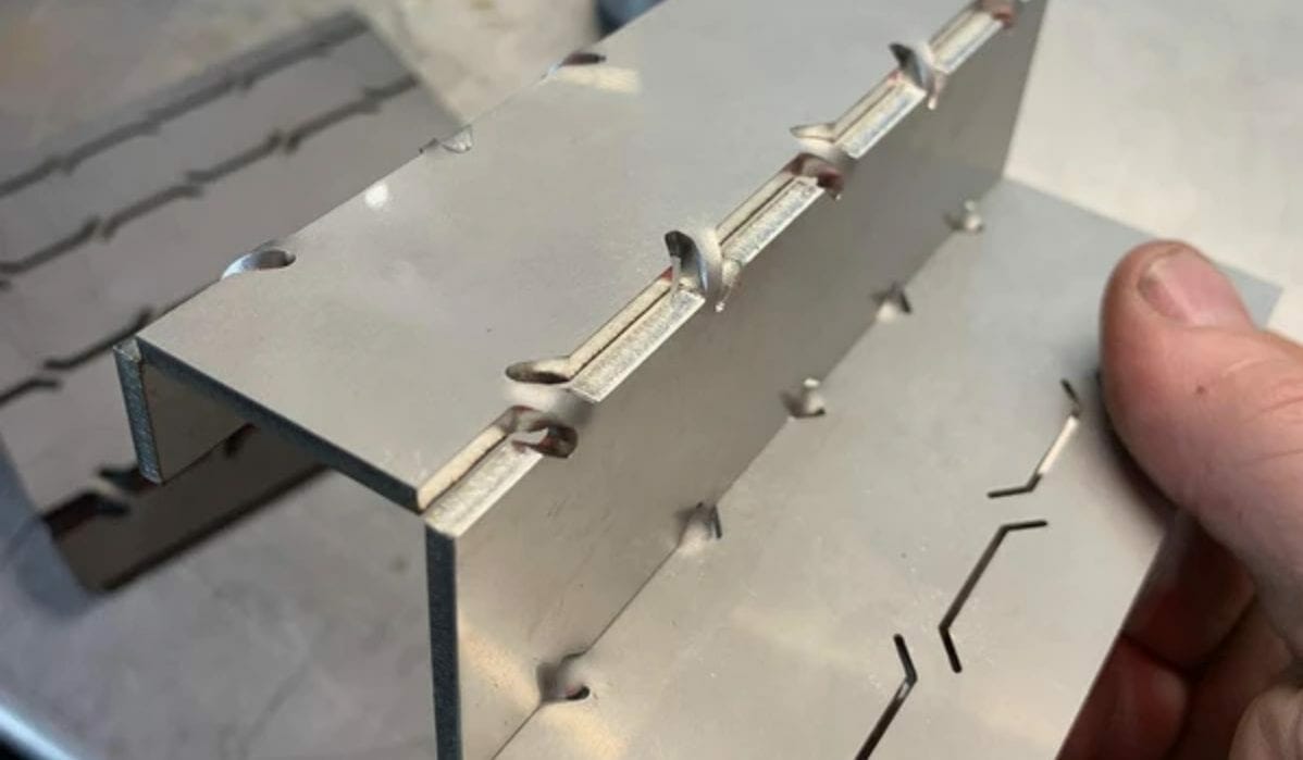 Wave bens in laser-cut metal from SendCutSend