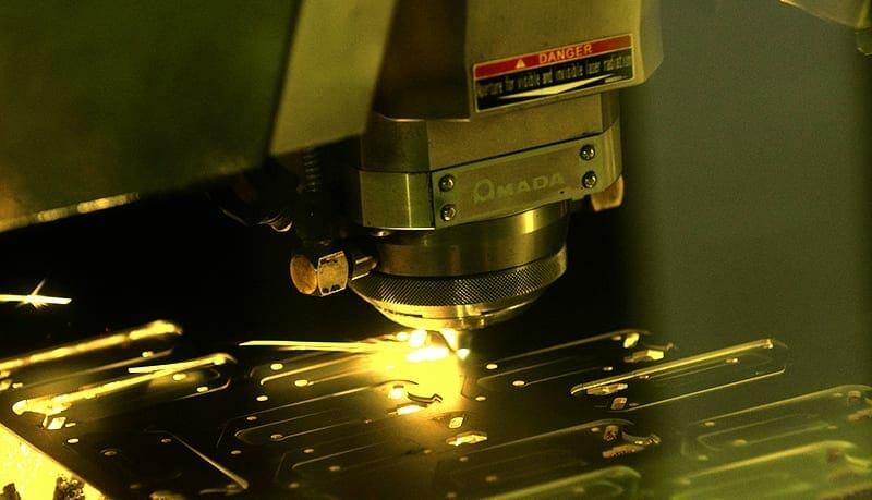 SendCutSend's fiber optic laser in action