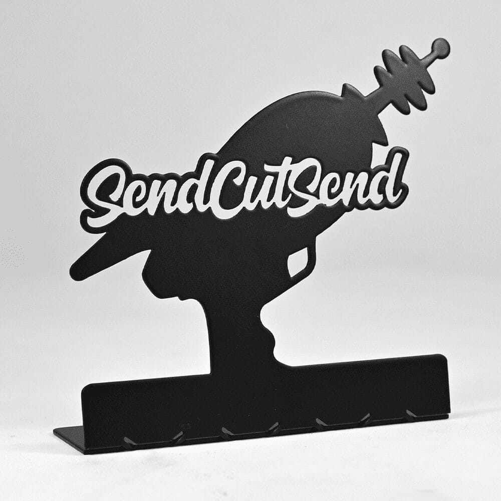 Image of a laser cut aluminum decorative laser gun silhouette powder coated in matte black