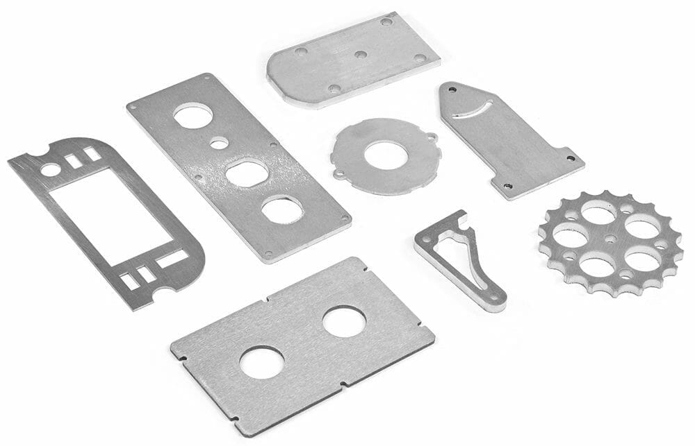 Image of 8 various laser cut 7075 aluminum parts