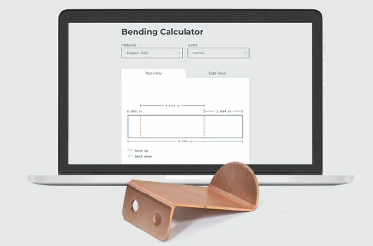 SendCutSend's bending calculator displayed on a laptop with a bent part sitting in front of it.