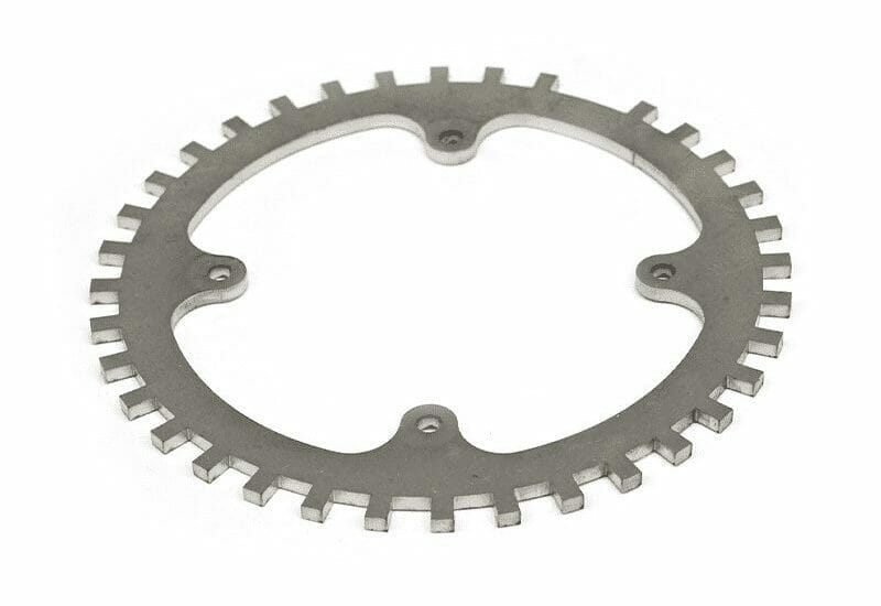 A gear laser cut out of cold rolled carbon steel