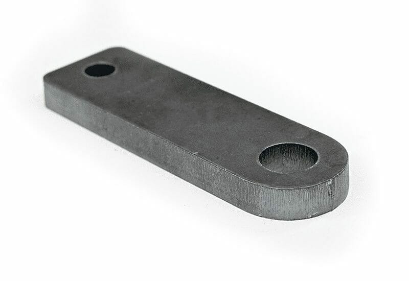 A small part laser cut out of hot rolled carbon steel