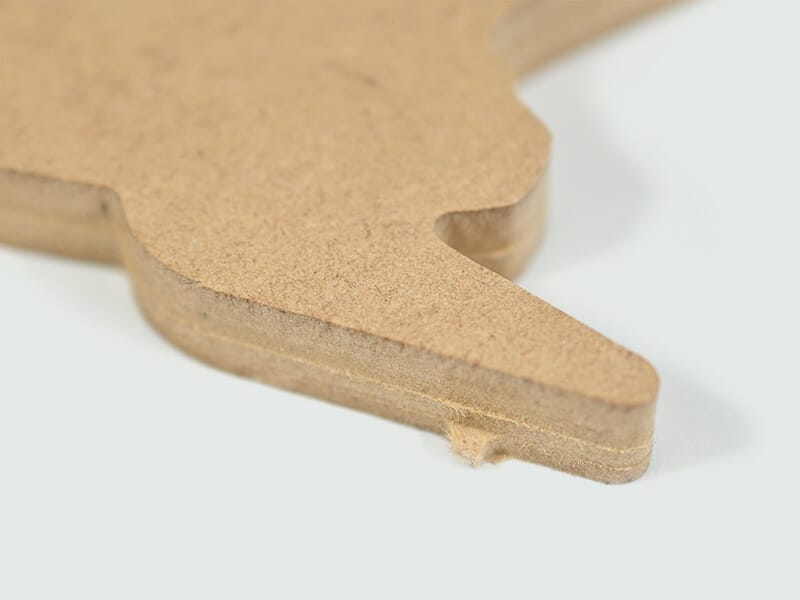 Fixture tabs in CNC routed materials can be removed through clipping, filing, or sanding.