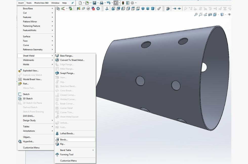 Screenshot showing the sheet metal toolbar in SolidWorks, with the "Bends" feature highlighted. The 3D model of the aluminum rolled hopper is in the background.