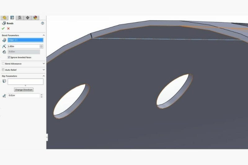 Screenshot of the 3D model of the rolled hopper zoomed in on the seam where the two ends meet. It's highlighted in orange and blue.