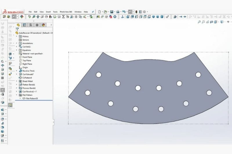 Screenshot of the 3D model of the rolled sheet metal hopper laid out flat in Solidworks. 