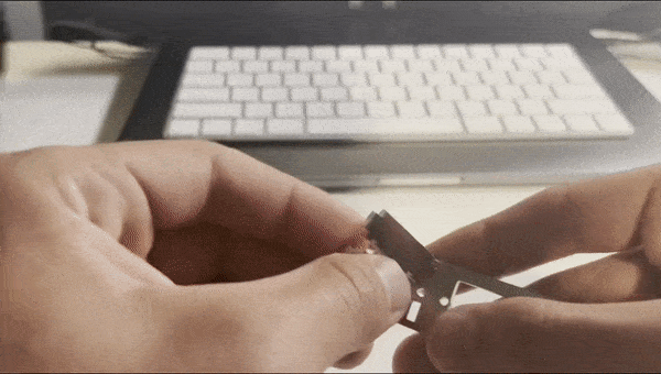Gif of someone putting a small scale design together with t-slots.