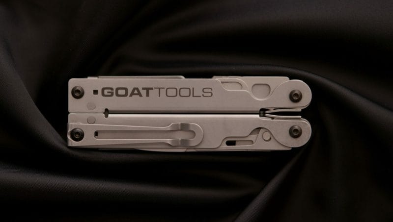 Image of a GOAT Tools customizable multitool on a black background