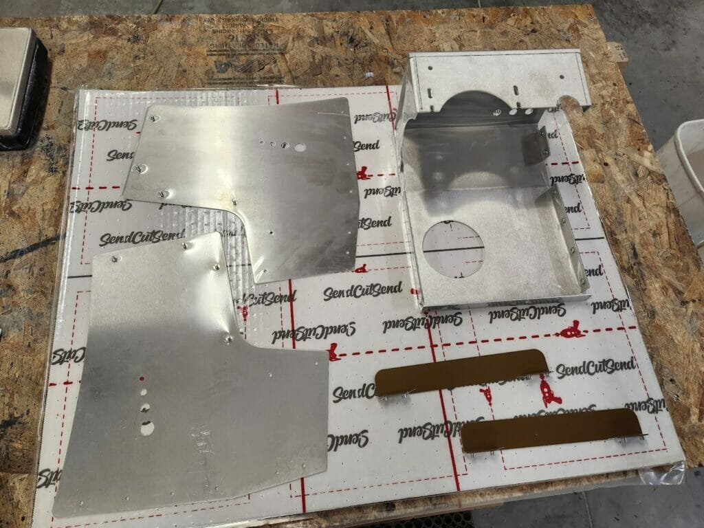 vacuum sealed sheet metal parts from SendCutSend 
