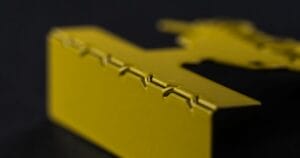 a sample of wave bending sheet metal from a SendCutSend custom part